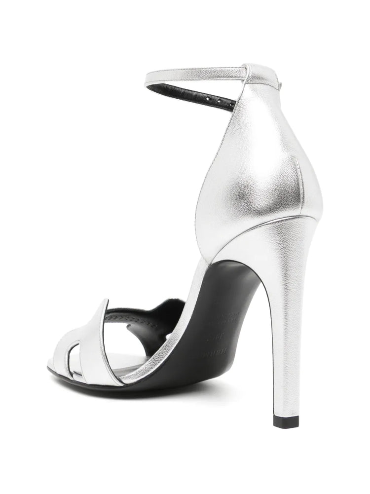 Pre-owned HERMÈS Joy 70 Sandals with tan leather straps and open toe design, displayed on a neutral background.
