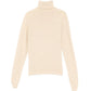 Hermès beige cashmere turtleneck top displayed on a mannequin, showcasing soft, luxurious knit fabric and classic style.
