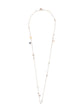 Hermès Ex Libris long necklace with elegant chain and detailed pendant, showcasing luxurious jewelry design.