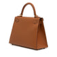 Hermès Kelly II Sellier 28 bag in Gold Epsom leather with gold-tone hardware, white contrast stitching, rolled top handle, detachable shoulder strap, front flap, belted straps, clochette, and padlock.