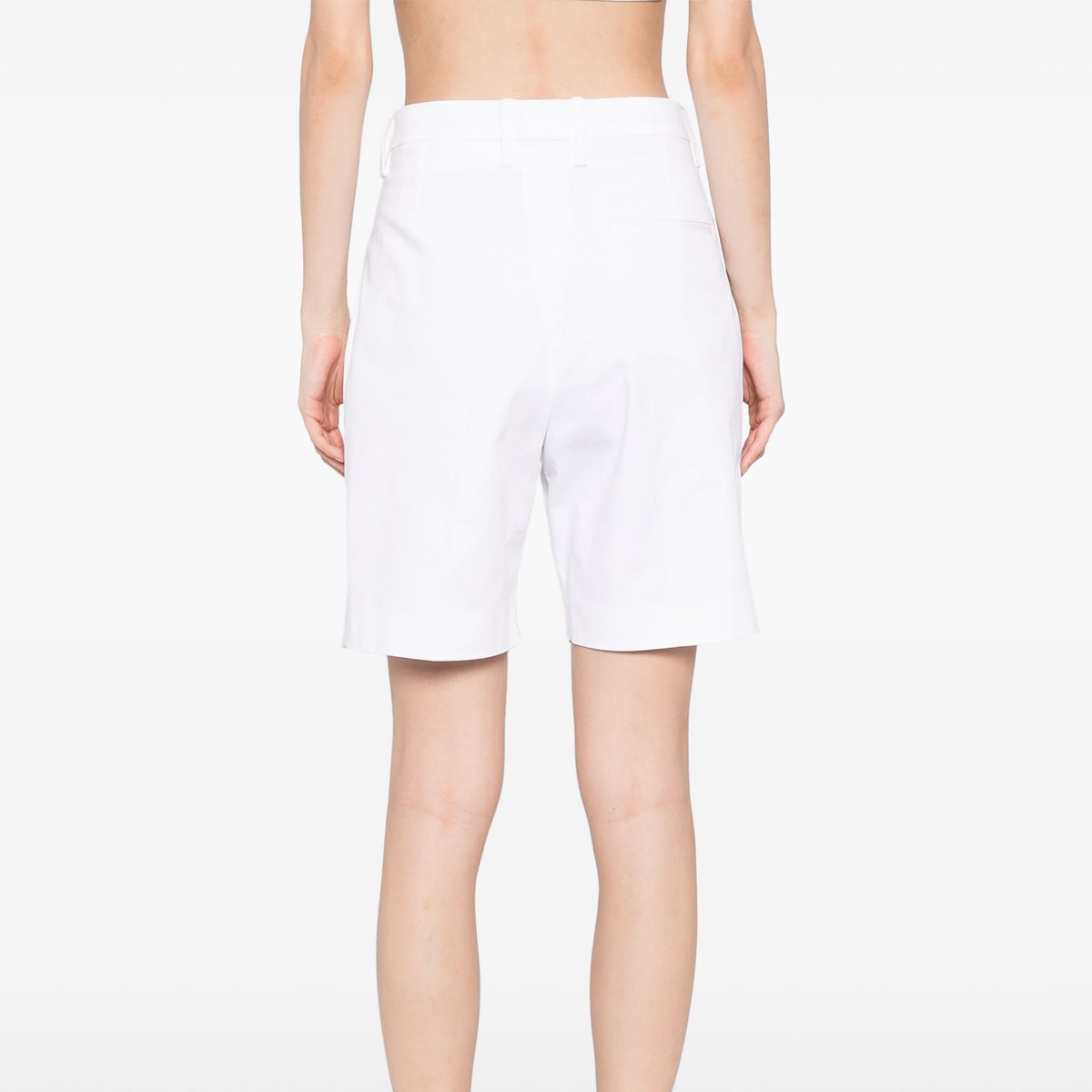 Hermès white pleated Bermuda shorts with a tailored fit, featuring a classic design and clean, structured look.