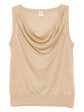 Hermès beige knit vest, cozy sleeveless top made of soft knit fabric, styled as a stylish and comfortable fashion piece.