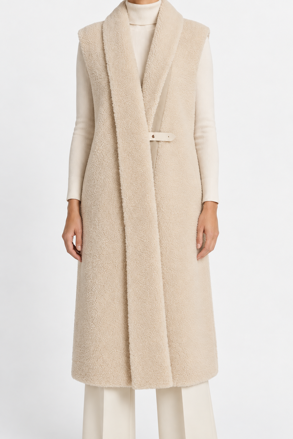 Hermès cream sheepskin gilet with silk scarf interior, stylish blazer jacket featuring luxurious fur and elegant design.