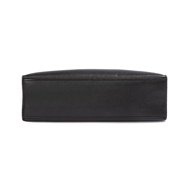 Hermès Kelly Pochette in black Swift leather, elegant handbag with gold hardware, showcasing a sleek and timeless design.