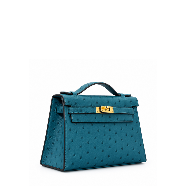 Hermès Kelly Pochette Bleu Colvert ostrich leather top handle bag with gold hardware, showcasing its elegant design and luxurious texture.