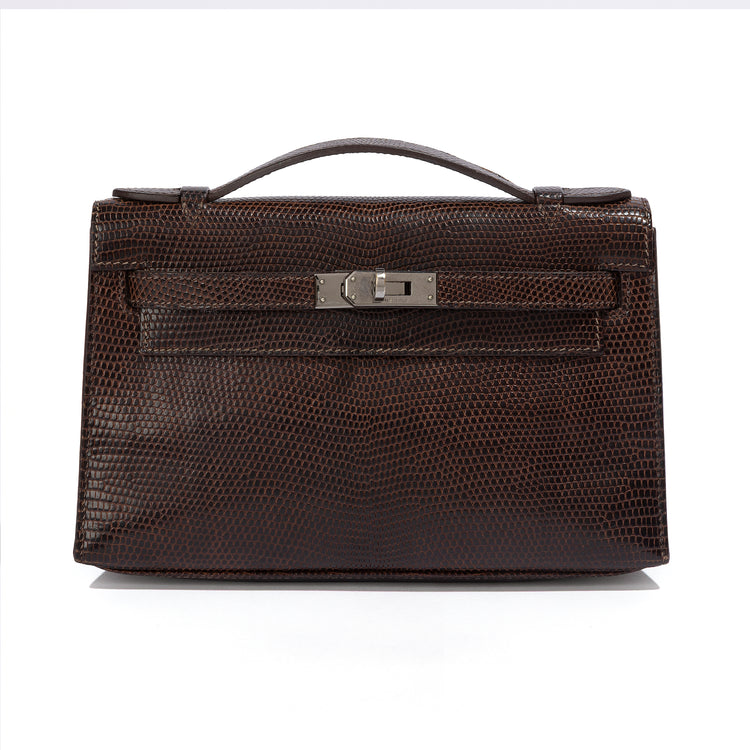Hermès Chocolat Niloticus Lizard Kelly Pochette handbag with sleek design and elegant leather details.