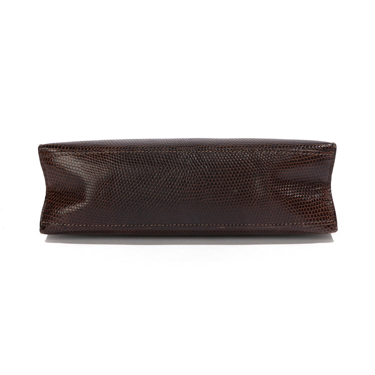 Hermès Chocolat Niloticus Lizard Kelly Pochette handbag with smooth leather finish and elegant design.