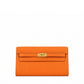 Hermès Kelly To Go Wallet in GHW with gold hardware, shown open with card slots and interior compartments.