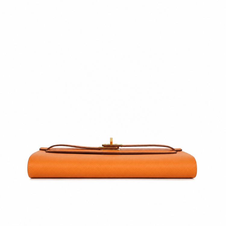 Hermès Kelly To Go Wallet in GHW with gold hardware, featuring compact design and multiple card slots, on a white background.