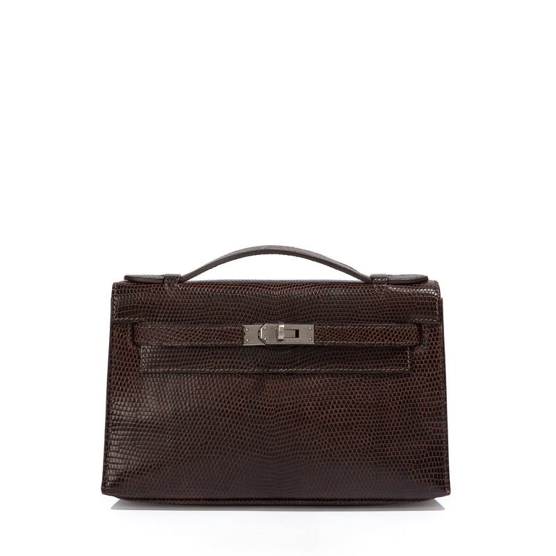 Hermès Chocolat Niloticus Lizard Kelly Pochette handbag with sleek design and rich chocolate brown color.