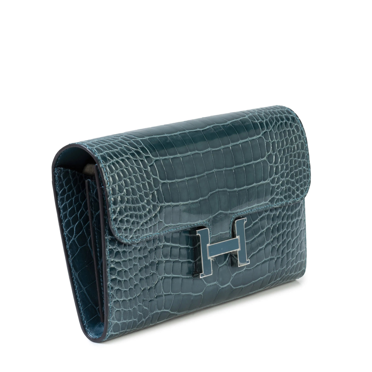 Hermès Constance Wallet with gold hardware and signature design, showcasing sleek leather material and compact style.