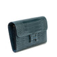 Hermès Constance Wallet with gold hardware and signature design, showcasing sleek leather material and compact style.