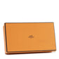 Hermès Constance Wallet with leather exterior and gold hardware, featuring multiple card slots and a sleek, compact design.