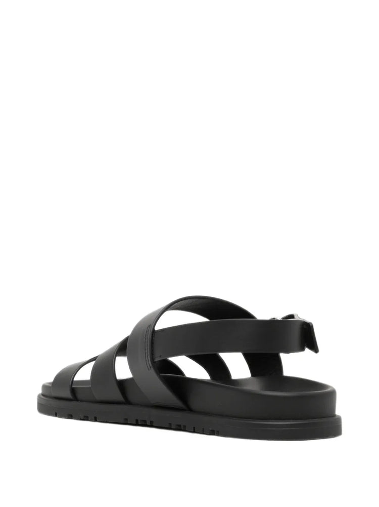 Pre-owned Hermès Genius sandal featuring tan leather straps and elegant design, displayed on a neutral background.