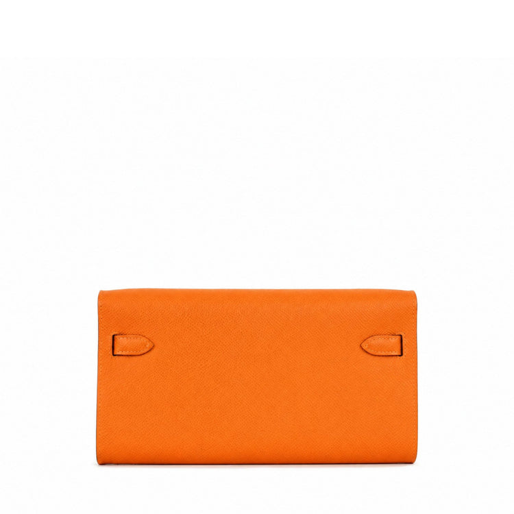 Hermès Kelly To Go wallet in GHW, shown from the back, featuring sleek leather design and gold hardware accents.