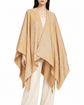 Hermès Cashmere New Libris Poncho scarf in soft, luxurious beige with subtle branding and elegant drape.