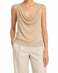 Hermès beige knit vest, cozy sleeveless top made of soft knit fabric, styled as a stylish and comfortable fashion piece.