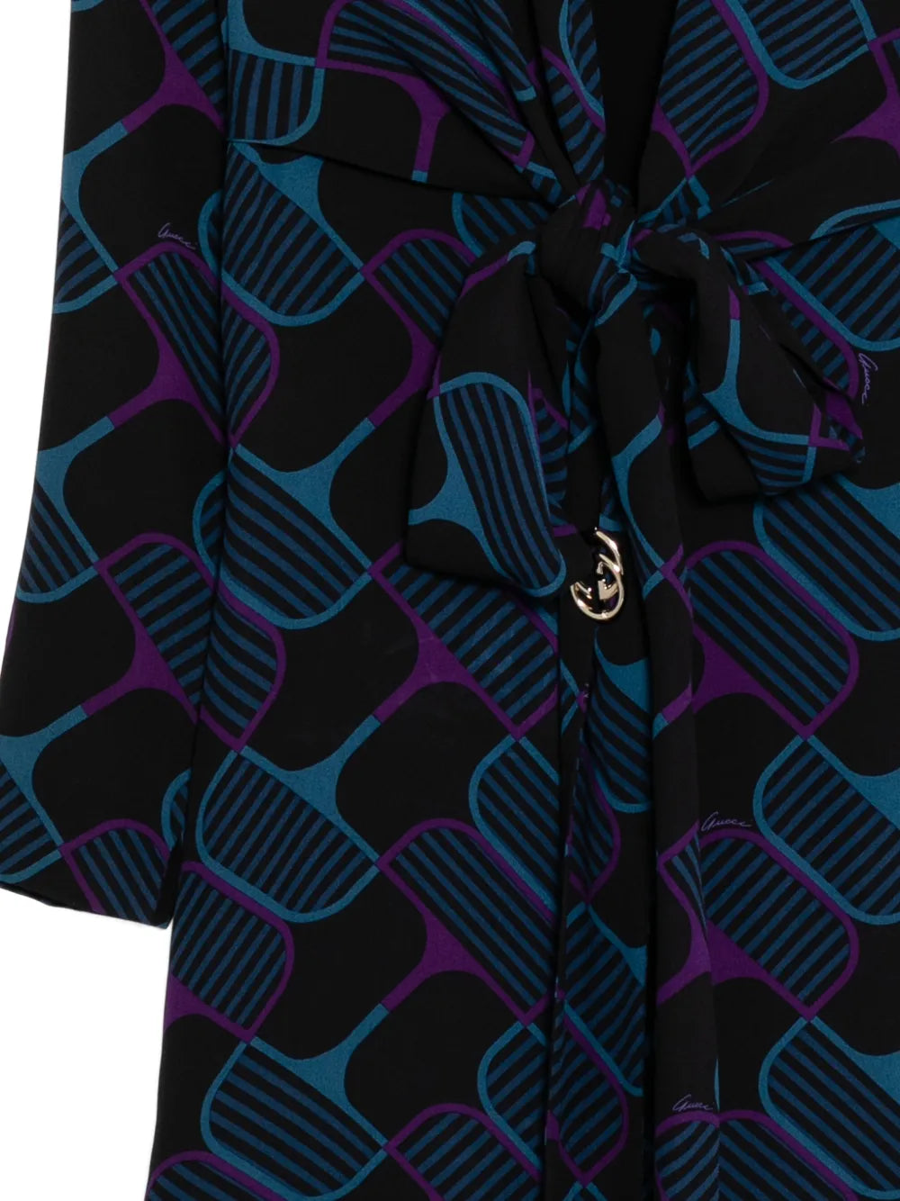 Gucci horsebit print dress featuring a stylish design, perfect for fashionable occasions, shown from a side view.
