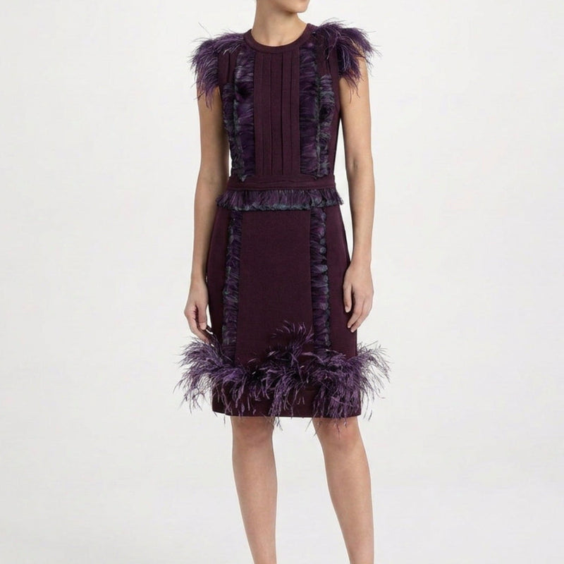 Purple feather wool dress by Lanvin featuring a flowing design and textured fabric, perfect for elegant occasions.