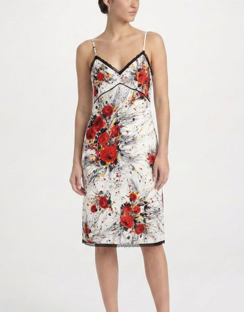 Prada floral print silk slip dress with delicate spaghetti straps and vibrant floral pattern on smooth silk fabric.