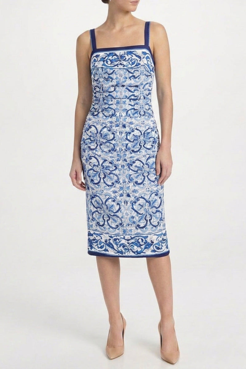 Dolce & Gabbana Majolica print dress showing vibrant floral patterns and flowing fabric on a stylish women&