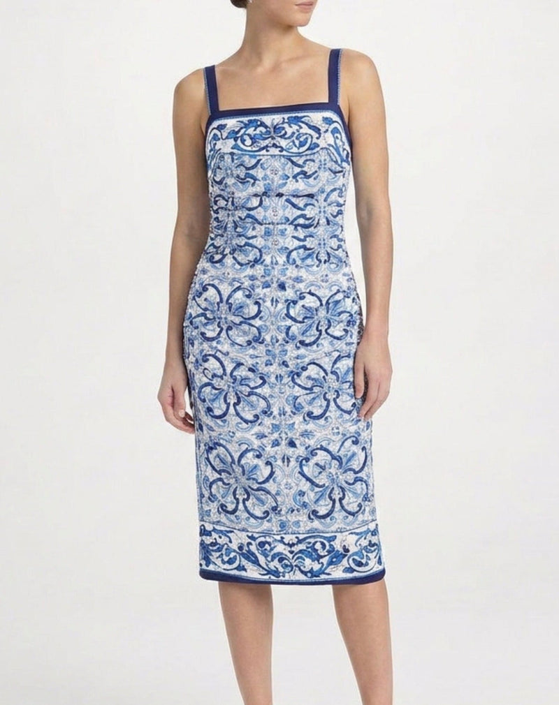 Dolce & Gabbana Majolica print dress showing vibrant floral patterns and flowing fabric on a stylish women&