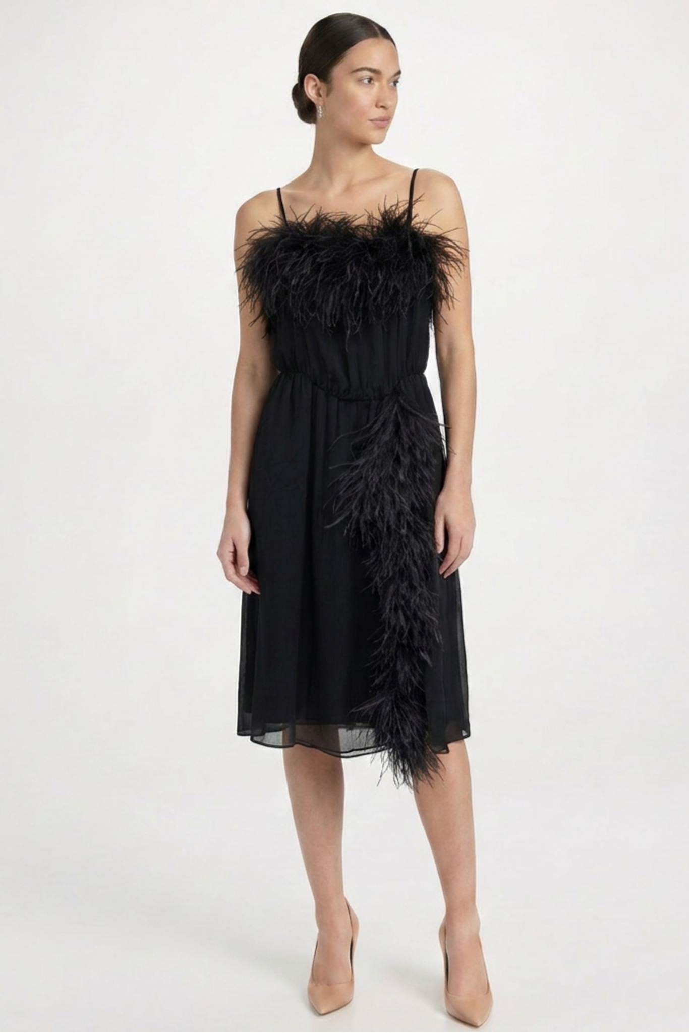 Prada feather slip dress featuring delicate feather details and a sleek, elegant silhouette for a stylish evening look.