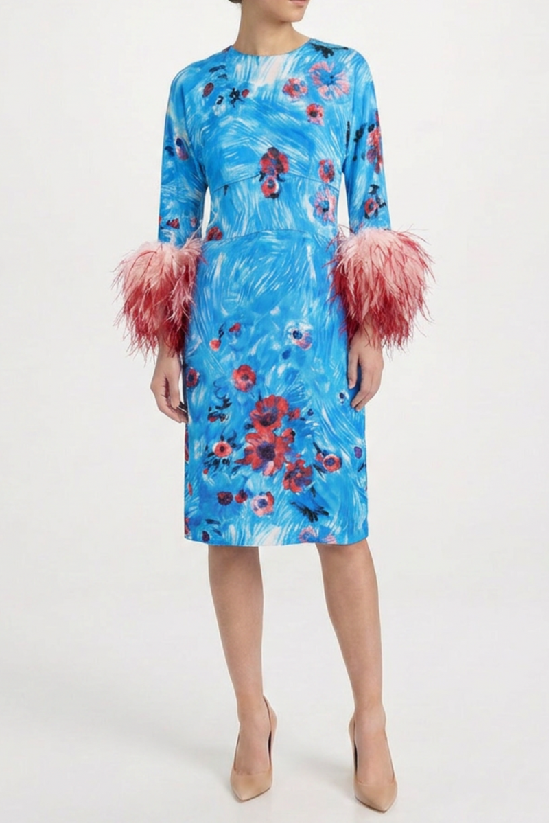 Prada 2017 feather dress with delicate feather details and elegant silhouette, displayed on a white background.