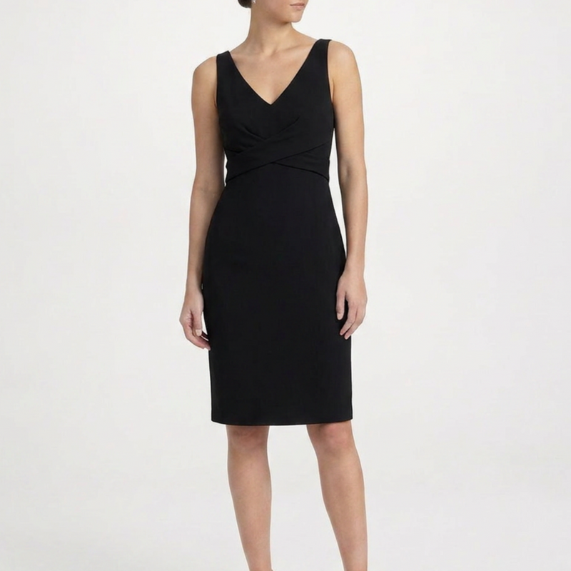 Black deep V-neck dress by Other Designers, stylish evening dress with fitted silhouette and elegant cut, shown on a model.
