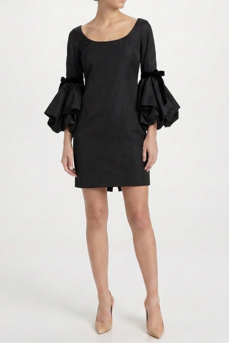 Black silk gothic bell sleeve dress by Saint Laurent, featuring flowing bell sleeves and a sleek, elegant silhouette.