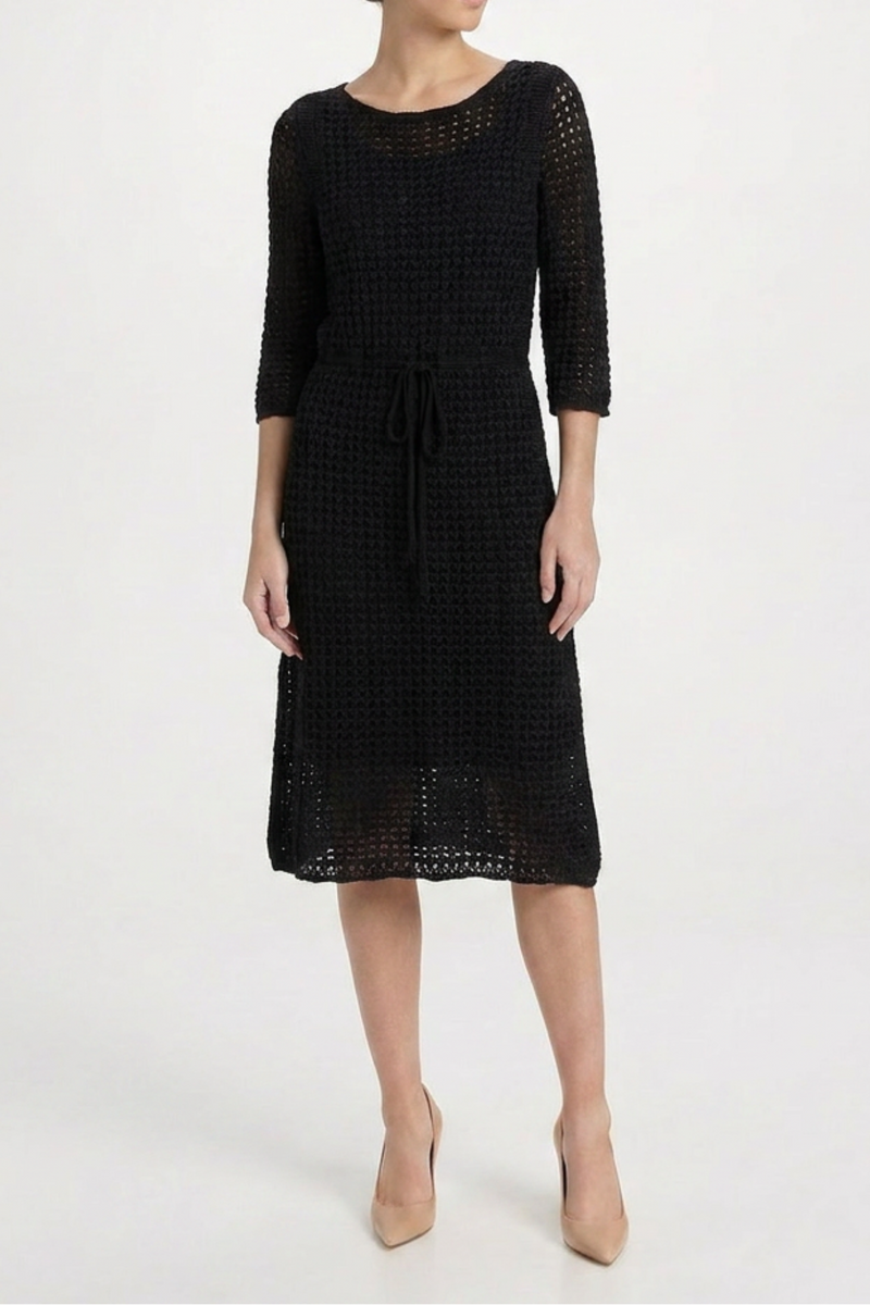 Black crochet silk midi dress by Prada, featuring intricate crochet details and a flowing midi length, perfect for elegant occasions.