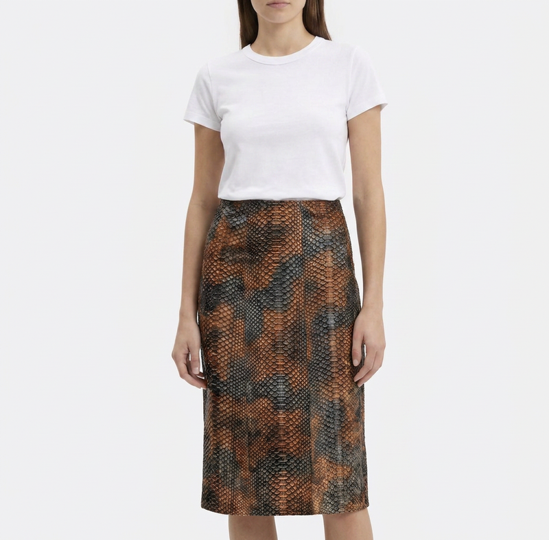 Prada brown leather A-line skirt displayed on a hanger, showcasing smooth texture and classic silhouette for stylish office or casual wear.
