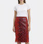 Red leather skirt with lace details from Dolce & Gabbana, featuring a fitted waist and elegant design.
