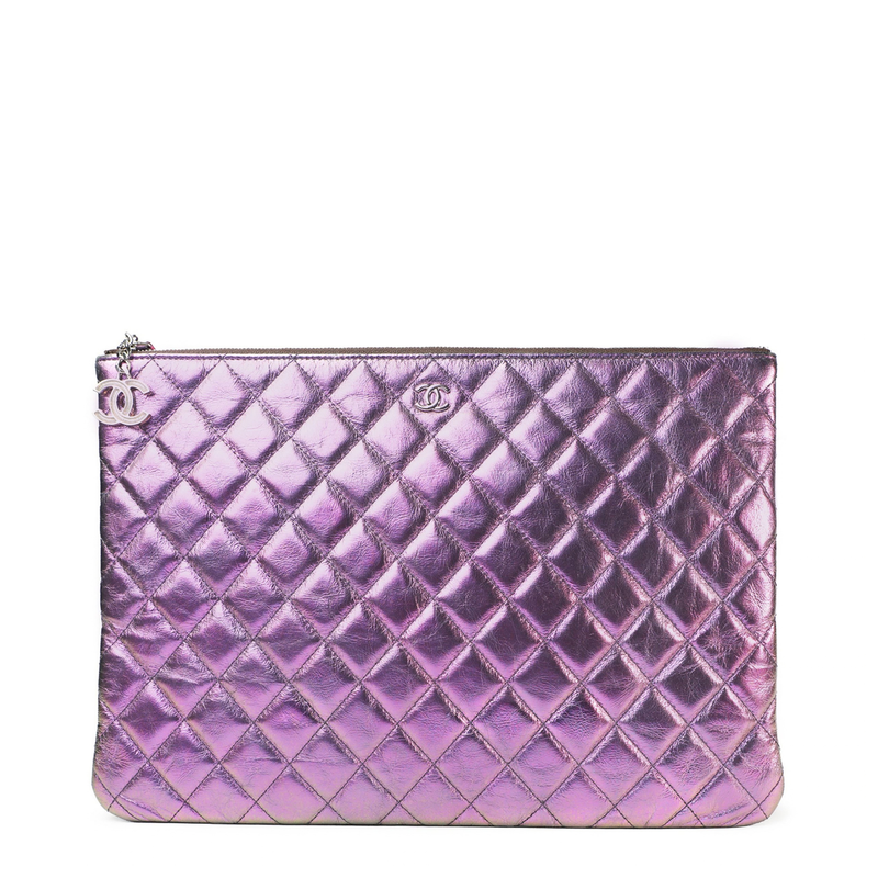 Iridescent purple quilted Chanel large O-case clutch with gold-tone hardware and sleek design, perfect for evening or special occasions.