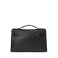 Hermès Kelly Pochette in black swift leather, compact handbag with gold hardware, elegant and luxurious design.