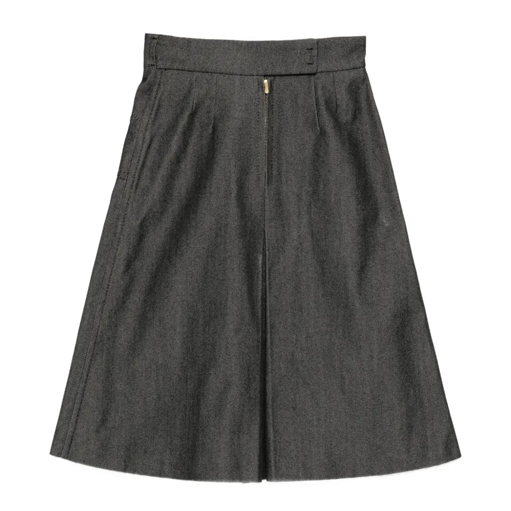 Back view of Louis Vuitton A-Line denim midi skirt, showcasing classic denim fabric and stylish silhouette.