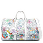 Louis Vuitton Comic Book Monogram Canvas Keepall Bandoulière 50 travel bag with monogram design and leather accents.