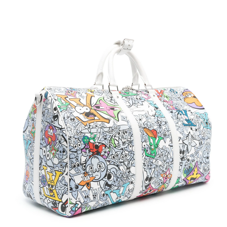 Louis Vuitton Comic Book Monogram Canvas Keepall Bandoulière 50 travel bag with monogram print and adjustable shoulder strap.