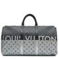 Louis Vuitton Eclipse Monogram Keepall Bandoulière 50 in grey and black Monogram canvas with rolled top handles, zip-top silver and oversized Louis Vuitton logo detail.