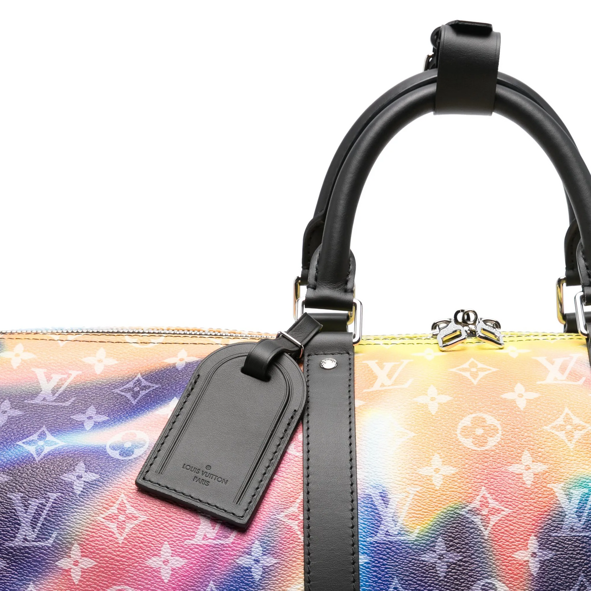 Louis Vuitton Keepall Bandoulière 50 Sunset travel bag with leather handles and spacious interior, ideal for weekend trips.