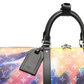 Louis Vuitton Keepall Bandoulière 50 Sunset travel bag with leather handles and spacious interior, ideal for weekend trips.