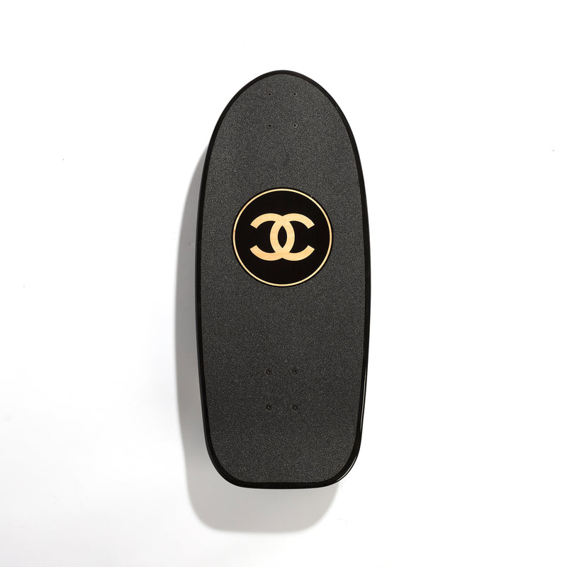 Louis Vuitton Limited Edition 2019 skateboard with designer logo and artistic graphics on a sleek object design.