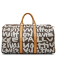 Louis Vuitton x Stephen Sprouse Graffiti Keepall 50 in brown Monogram canvas with oversized white graffiti lettering, Vachetta leather handles and gold-tone hardware.