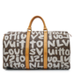 Louis Vuitton x Stephen Sprouse Graffiti Keepall 50 in brown Monogram canvas with oversized white graffiti lettering, Vachetta leather handles and gold-tone hardware.