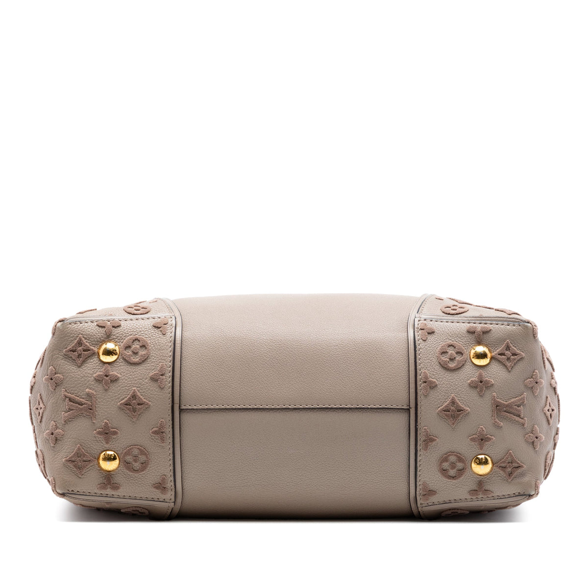 Louis Vuitton Veau Cachemire Tote PM handbag in soft leather with subtle stitching, featuring dual top handles and spacious interior.