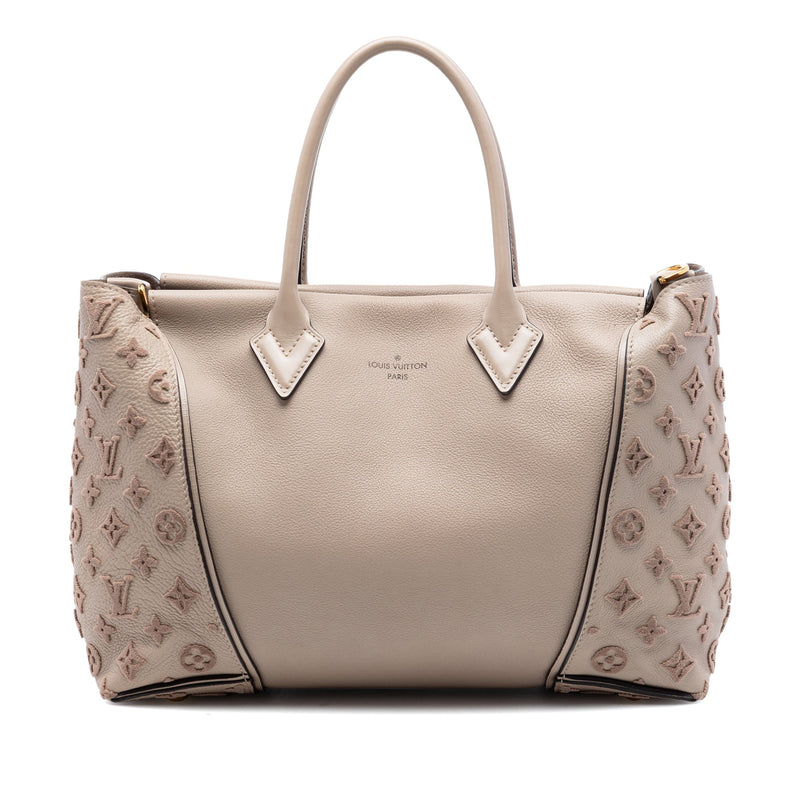 Louis Vuitton Veau Cachemire Tote PM handbag in beige grained leather with tonal Monogram embroidered side panels, double top handles and gold-tone hardware.