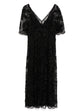 Elegant Louis Vuitton lace dress with intricate detailing, flowing fabric, and a sophisticated design perfect for formal occasions.