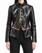 Louis Vuitton black leather jacket with gold-tone Monogram front panel, high stand collar, asymmetric button fastening and red and white waist trim.