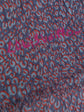 Louis Vuitton cheetah print scarf with bold animal pattern and luxurious fabric, stylish accessory for versatile fashion looks