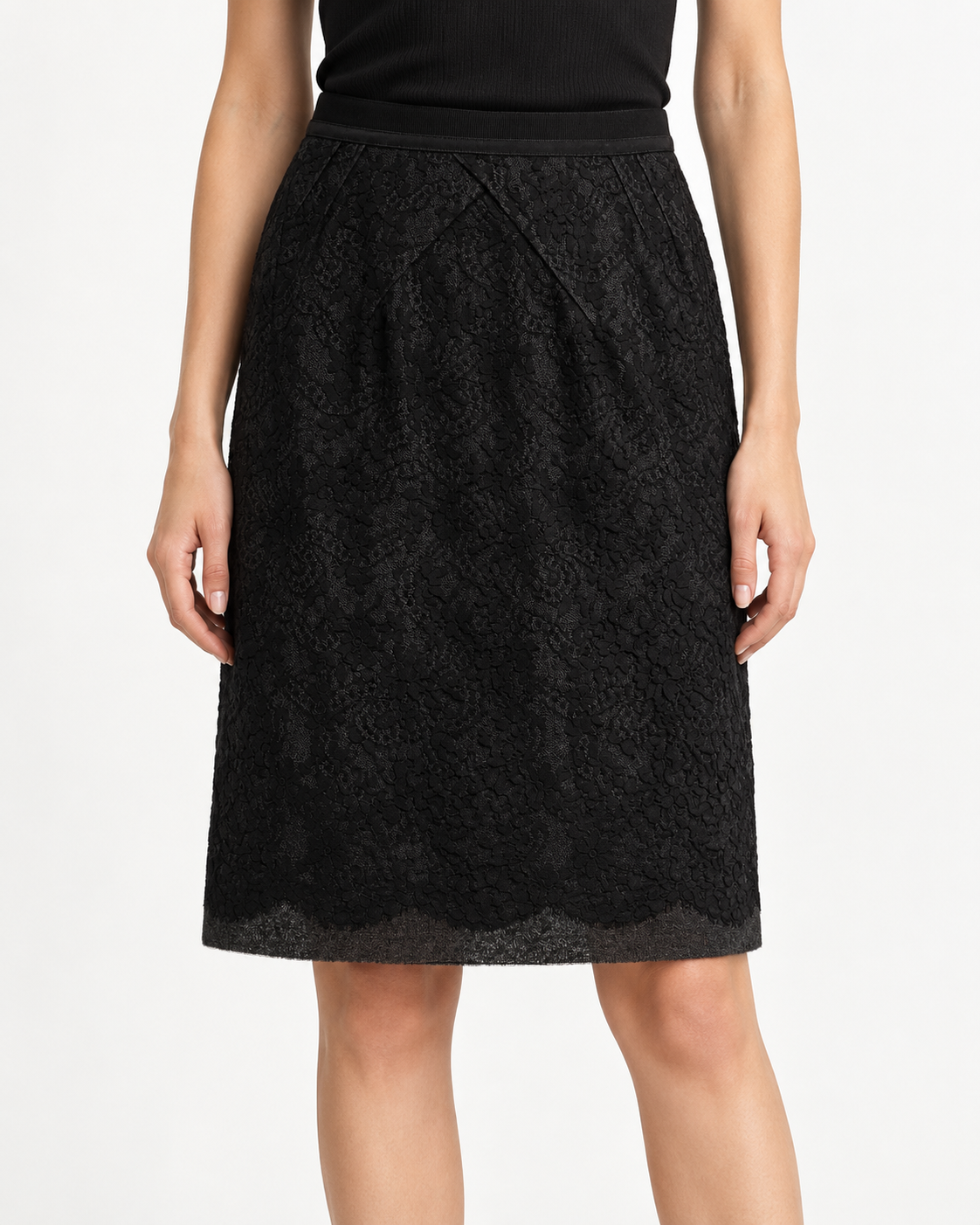 Louis Vuitton black mid-length lace skirt with floral lace overlay, smooth waistband, subtle front pleating and scalloped hem.